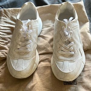 Used Gucci tennis, worn once. Comes with Original box and buster bag.